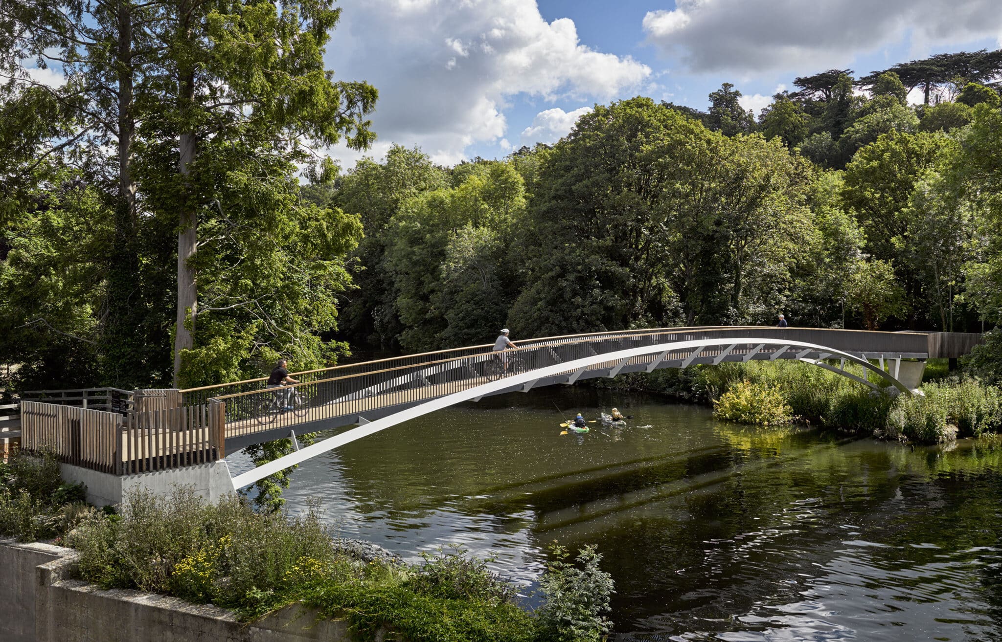 Taplow Footbridge crossing a landscaped lake
